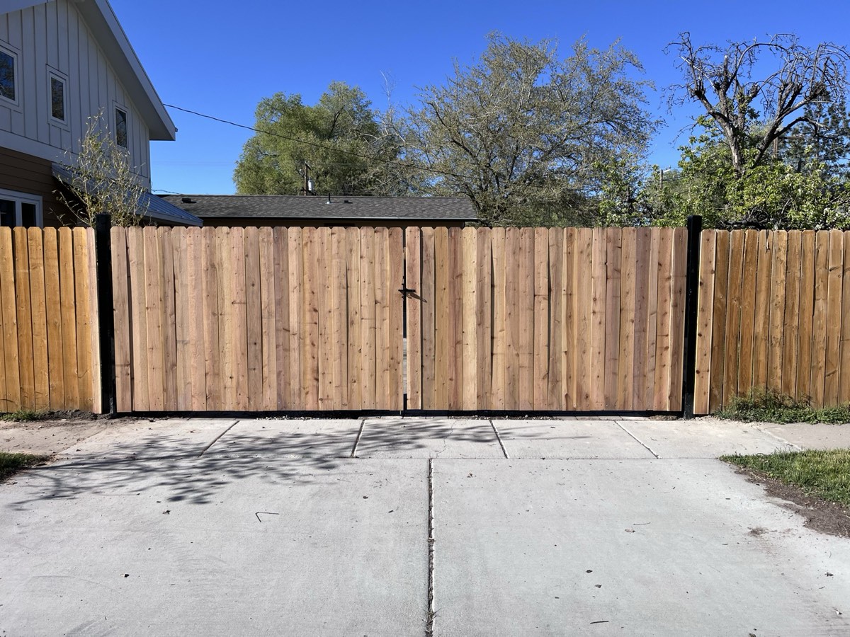 Cedar double drive gate we built across a driveway