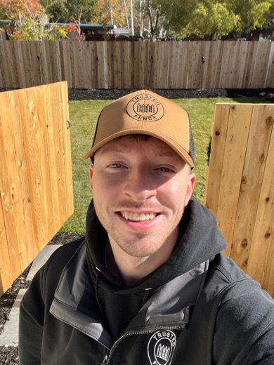 Landon Mickelson, owner of Trusted Fence Company, at a cedar fence job in Salt Lake City, UT