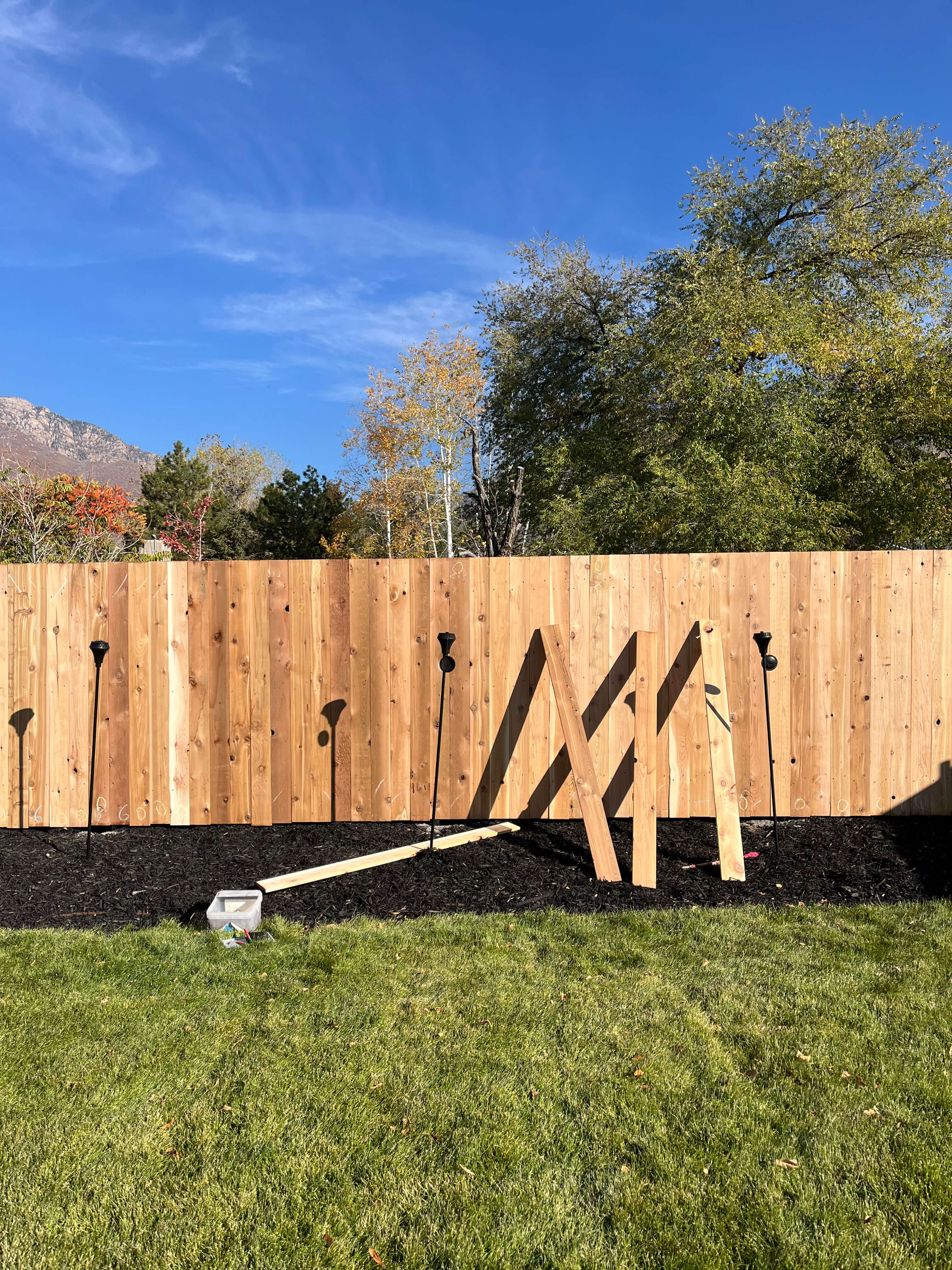 Custom cedar fence with mountain backdrop